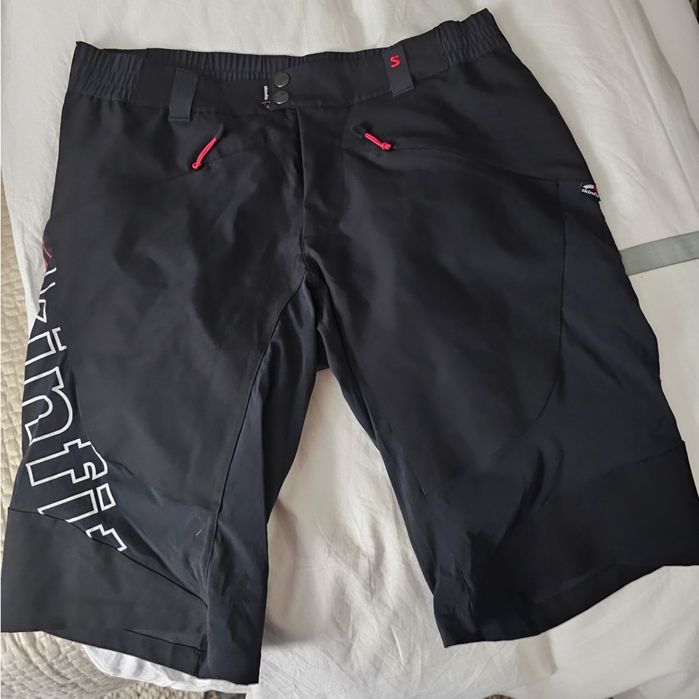 Black Cycling Shorts with Red Accents Skinfit of Austria Triathlon Gear